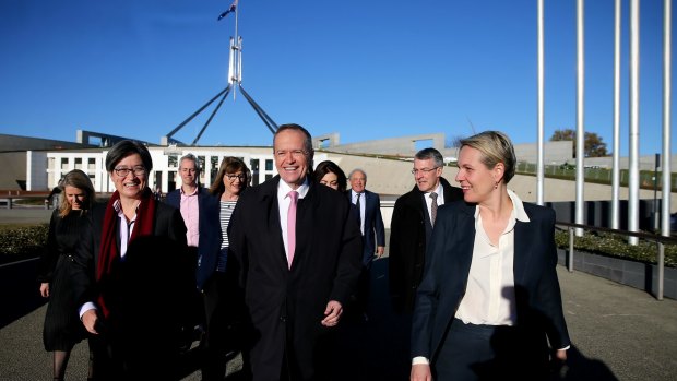 Senior Labor figures, including Senator Penny Wong, Opposition Leader Bill Shorten and Deputy Opposition Leader Tanya Plibersek arrive at a 'Sea of Hearts' event in support of marriage equality on the front lawn of Parliament House on Tuesday.