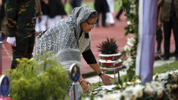 Bangladesh's Prime Minister Sheikh Hasina Wajed offers her tribute to the victims of the attack at a stadium in Dhaka.