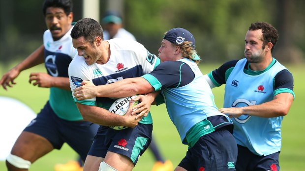 Ready to lift: Dave Dennis runs the ball during a NSW Waratahs training session this week.