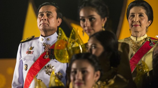 Thai Prime Minister Prayut Chan-o-cha, left, during celebrations for Thailand's late King Bhumibol Adulyadej on his 88th birthday in 2015. 