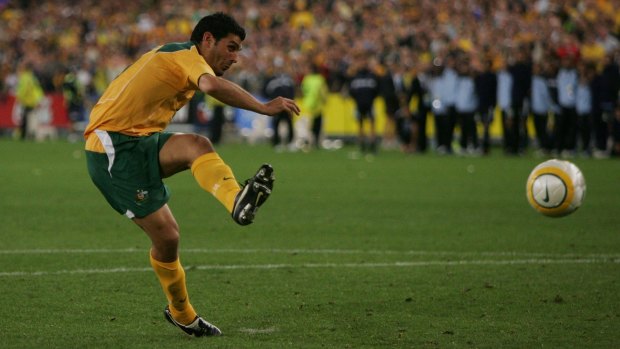 Going to the World Cup: John Aloisi fires home his famous penalty against Uruguay.