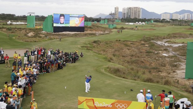 Adilson da Silva of Brazil hits the first ball on the first hole.