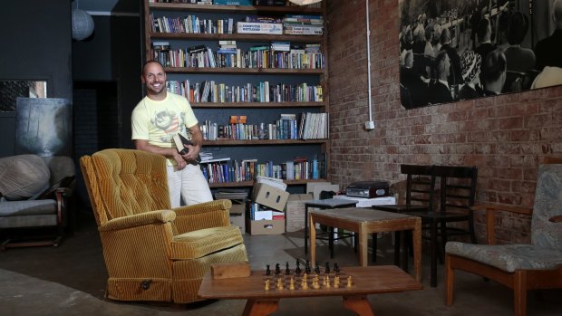  Two Before Ten owner Chris Dennis in the library that will be part of the Bolt Bar and Two Before Ten at Aranda shops.