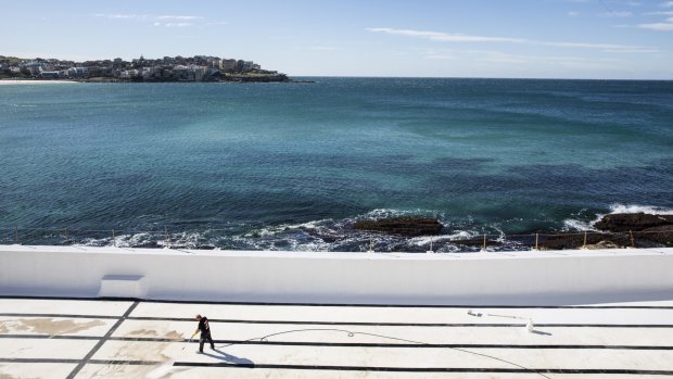 Making the most of the cold: Bondi Icebergs swimming pool gets a clean as a winter chill sets in over Sydney.