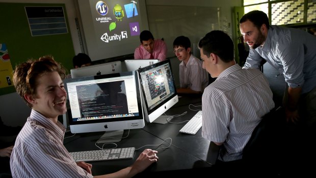 App developers Alex Benevento and William Egan  teach students how to develop code at their  old school Penleigh and Essendon Grammar where they have  started a code club.