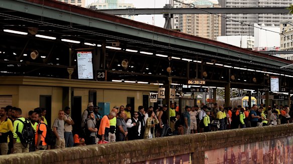 Commuters wait for train at Central Station in Sydney's CBD on Wednesday morning.