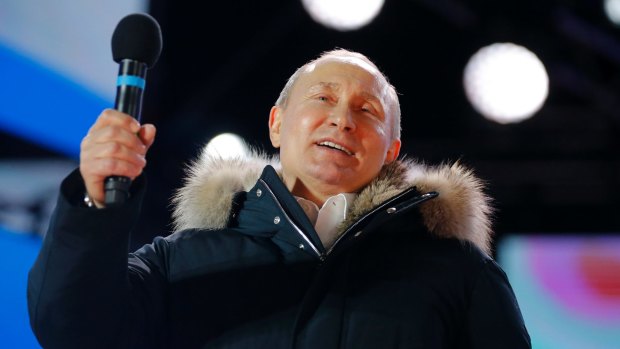 Russian President Vladimir Putin at a rally near the Kremlin in Moscow. 