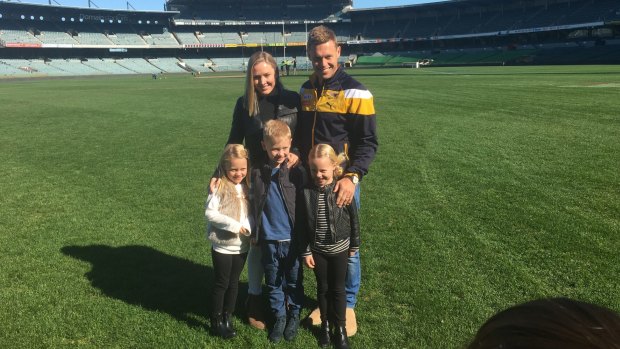 Sam Mitchell with his family at Domain Stadium after announcing his retirement from AFL.