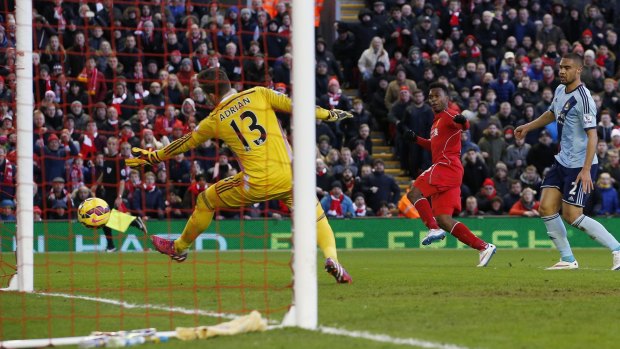 Welcome return: Liverpool's Daniel Sturridge shoots to score a goal during their English Premier League soccer match against West Ham United at Anfield.