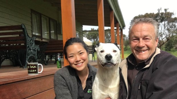 French Island Eco Inn owner Phil Bock, wife Yuko and dog Sam.