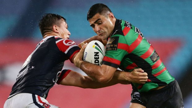 Bryson Goodwin is tackled by Joseph Manu during the round four NRL match.