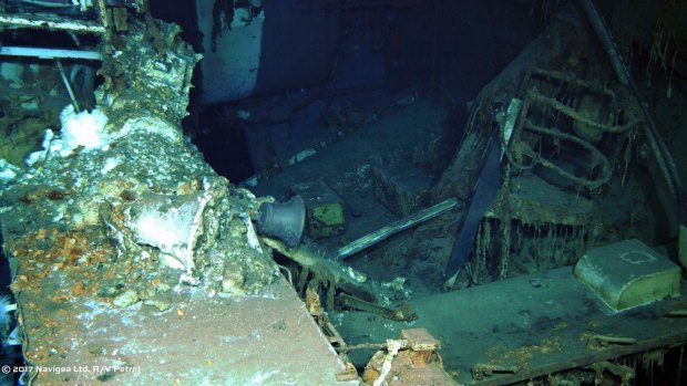 The wreckage of the USS Indianapolis, including the ship's bell at the bottom of the North Pacific Ocean as seen by a remotely operated camera.