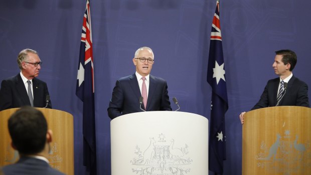 David Gonski, Prime Minister Malcolm Turnbull and Education Minister Simon Birmingham on Tuesday. 