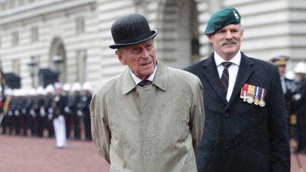 The Duke of Edinburgh – also the Captain General of the Royal Marines – at his last official public engagement at Buckingham Palace on Wednesday.