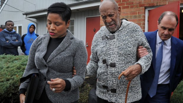 Actor and comedian Bill Cosby leaves court on Wednesday. 