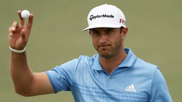 Red hot: Dustin Johnson after his birdie on the second at Augusta National.