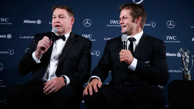 Black tie event: Steve Hansen and Richie McCaw accept the award on behalf of the All Blacks.