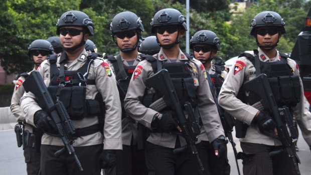 There was a heavy polcie presence ourside the court for day one of the trial of Jakarta governor Ahok.