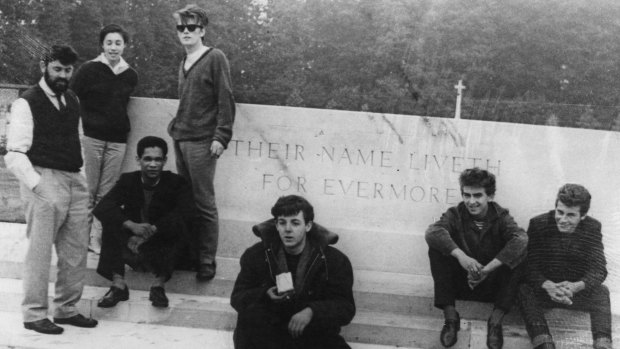 Beatles manager Allan Williams, his wife Beryl, Williams' business partner and black Calypso singer Lord Woodbine, Stuart Sutcliffe, Paul McCartney, George Harrison and Pete Best at Arnhem War Memorial in 1960.