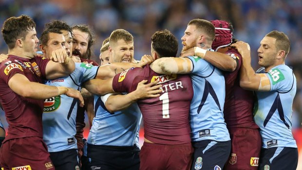 Billy Slater of the Maroons gets involved in a melee during game two of the State of Origin series between the New South Wales Blues and the Queensland Maroons at the Melbourne Cricket Ground.