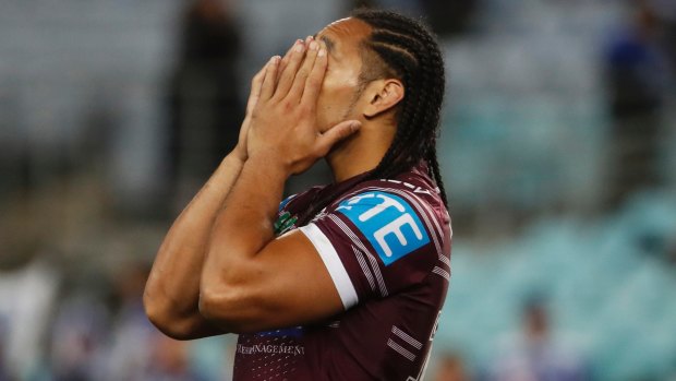 Missed opportunity: Martin Taupau puts his head in his hands after the loss.