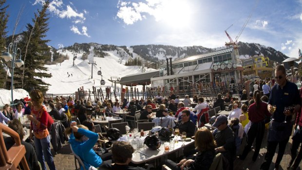 Wind down: When the skiing stops the action really begins; it's apres time at Ajax tavern next to the Little Nell.