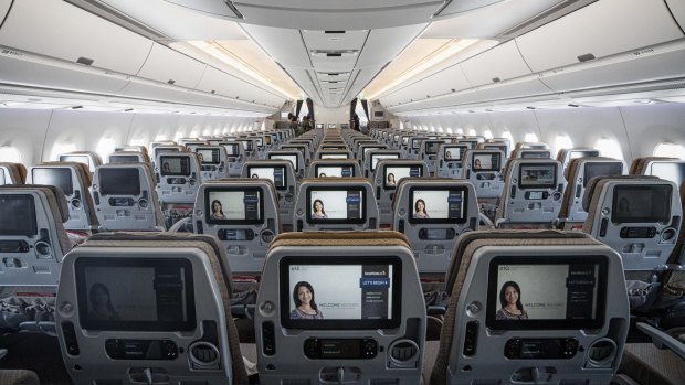 Entertainment monitors in the economy class cabin of a Singapore Airlines Airbus SE A350 aircraft.