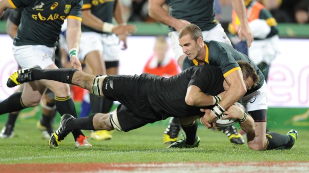 Richie McCaw crashes over for the winning try.