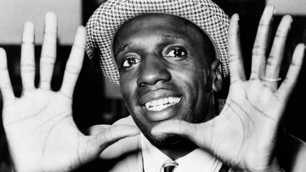 Prince: Meadowlark Lemon shows off his large hands on arrival in London in 1959.