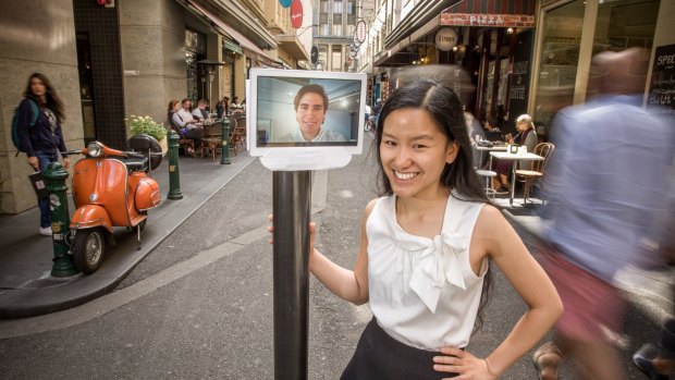 Virtual friends: Entrepreneur Marita Cheng with the robot likeness of fellow entrepreneur Alberto Rizzoli.