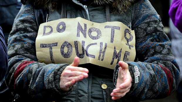  A woman protests against the New Year's Eve sex attacks in Cologne. Legal loopholes appear to favour the sex offender in Germany.