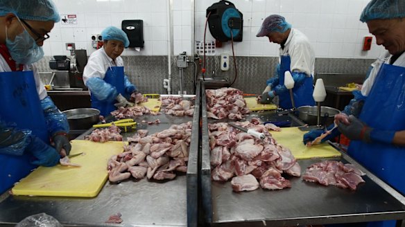 About 14,000 chickens are processed in this Marrickville factory every day.