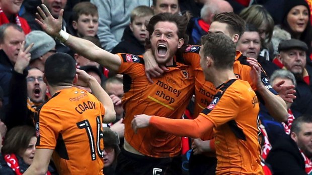 Joy for Wolves as Richard Stearman celebrates scoring his side's first goal against Liverpool.