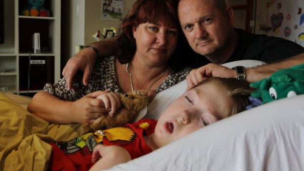 Jo-ann and Michael Morris with their son, Samuel, in 2013 when he was in palliative care at Bear Cottage in Manly.