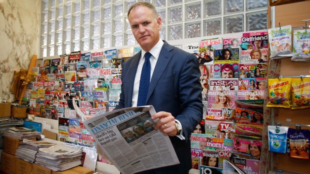 Newspaper Works chairman Michael Miller with a copy of The Australian Financial Review. 