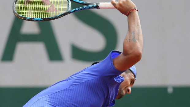 Nick Kyrgios breaks his racket in his second round match against South Africa's Kevin Anderson.