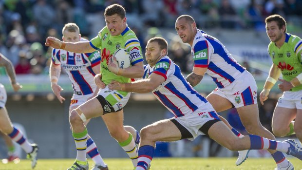 Jack Wighton charges ahead for the Raiders.