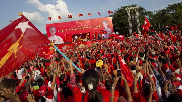 Supporters of Myanmar's opposition leader Aung San Suu Kyi rally in Yangon on Sunday.