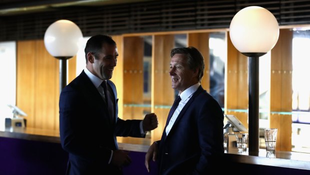 Storm before the calm: Melbourne captain Cameron Smith and coach Craig Bellamy relax prior to the NRL grand final press conference.