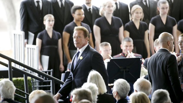 Arnold Schwarzenegger arrives for the funeral service for Nancy Reagan.