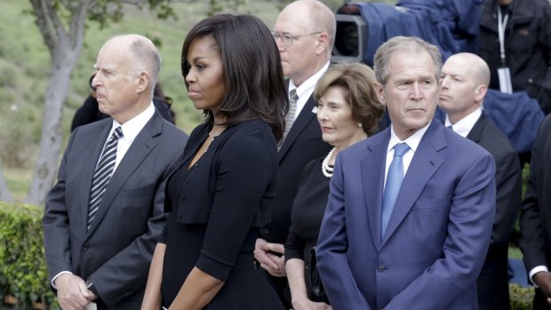 Michelle Obama and former president George W. Bush at Nancy Reagan's funeral.