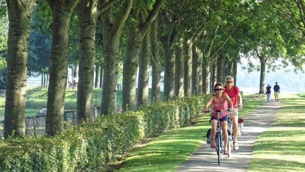 Cyclists on the dyke at Veere in the Netherlands.