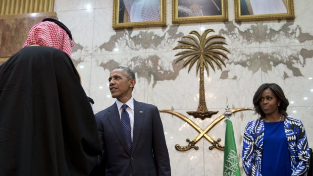 President Barack Obama and first lady Michelle Obama participate in a receiving line with the Saudi Arabian King, Salman bin Abdul Aziz, at Erga Palace in Riyadh, Saudi Arabia.