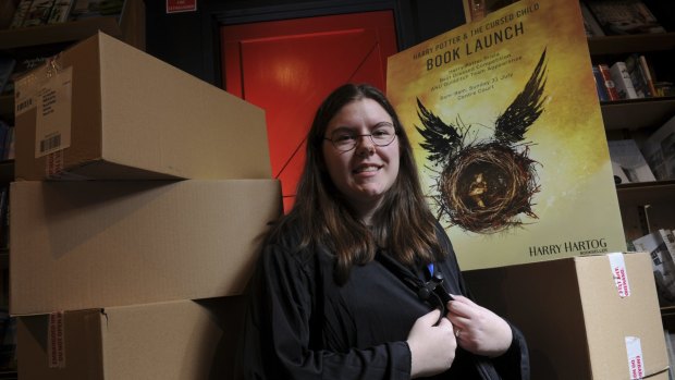 Harry Hartog store team leader Kaitlyn South stands among boxes of 'Harry Potter and the Cursed Child', with strict instructions not to open them until 9.01am on Sunday.
