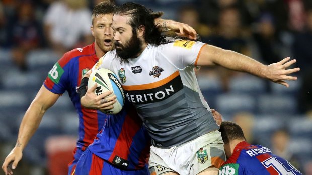 No excuses: Wests Tigers enforcer Aaron Woods says it is time for his young side to lift when they face the table-topping Broncos on Sunday.