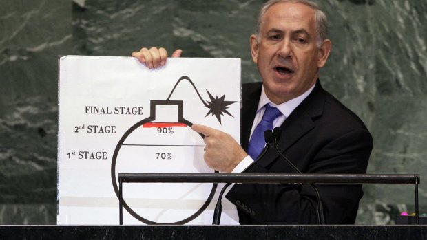 Israeli Prime Minister Benjamin Netanyahu  warns the UN General Assembly of the dangers of Iran's nuclear program in September 2012.