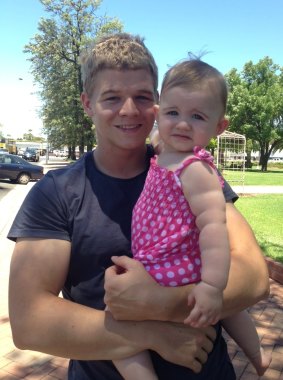 Canberra Raiders player Haydon Hodge with his daughter, Lola.