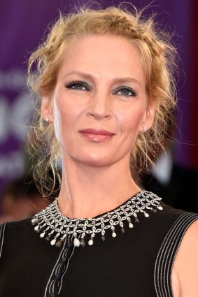 Uma Thurman sporting her normal smokey-eyed look at the Venice Film Festival on September 1, 2014.