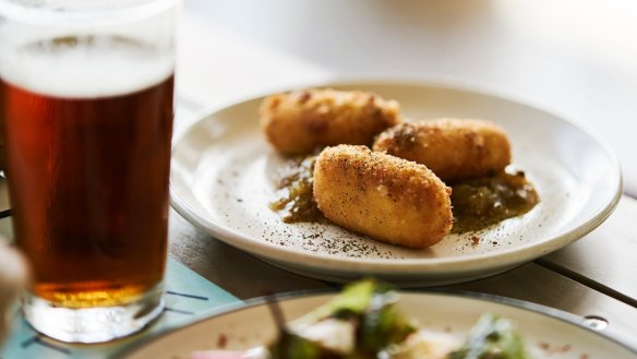 Braised ham hock and manchego croquettes with green tomato chutney. 