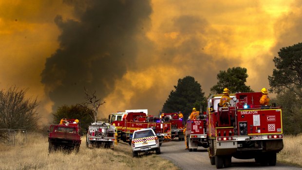 CFA firefighters fight a fast-moving fire near Mount Bolton.